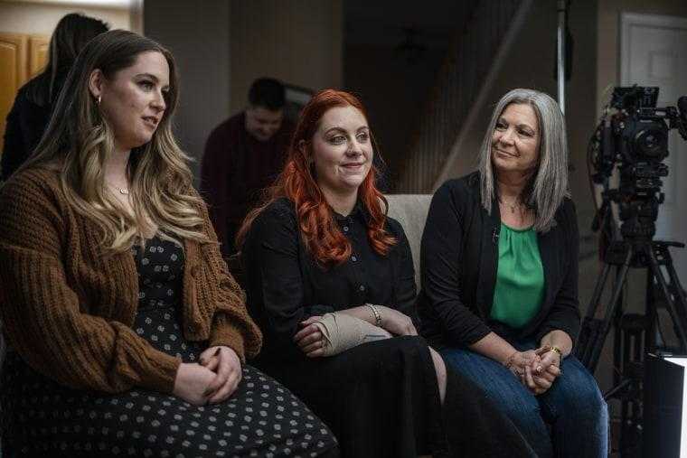 Virginia elementary school teacher Abigail Zwerner, center, her mother Julie, right, and sister Hannah, left, speak during an interview at an undisclosed location in Virginia on March 20, 2023.