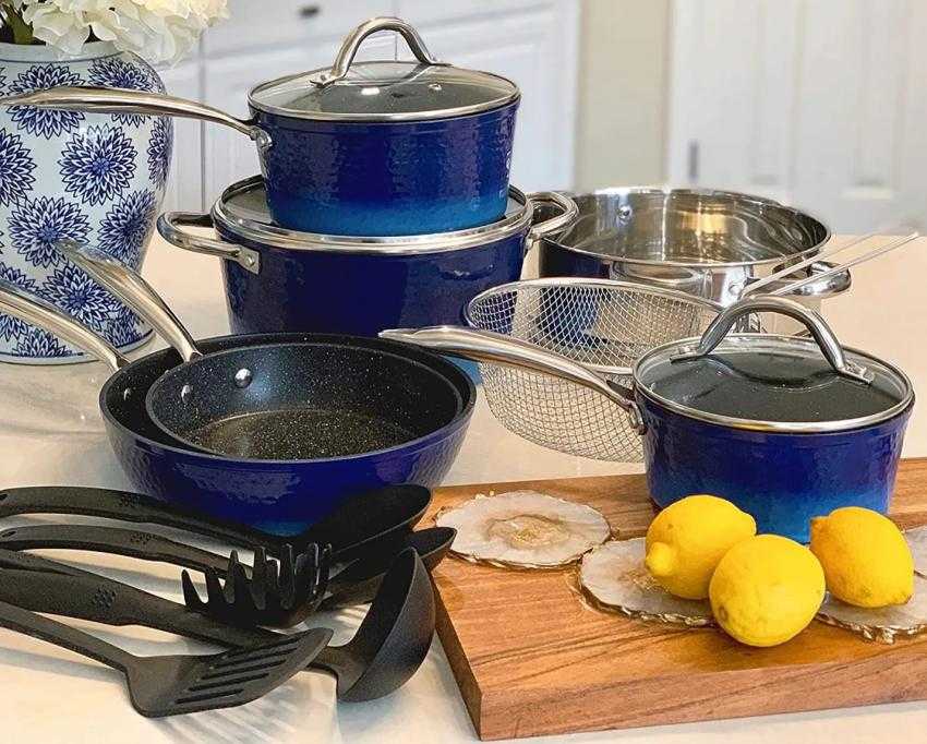A group of blue pots and pans on a table
